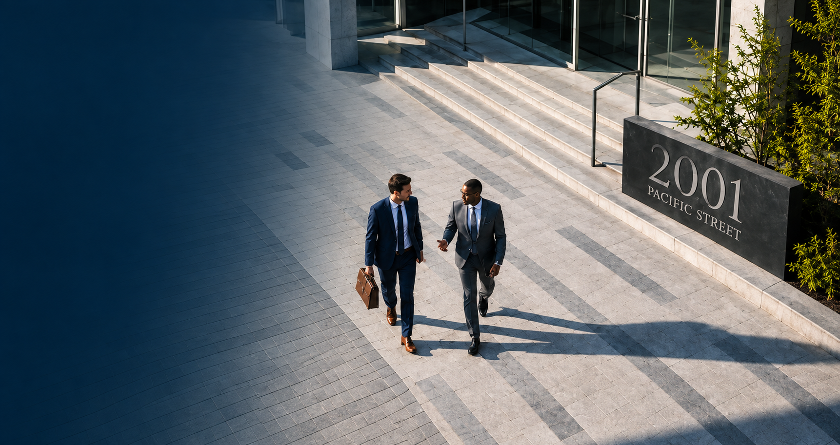 Exterior architectural granite staircase outside 2001 Pacific Street office building entrance with businessmen